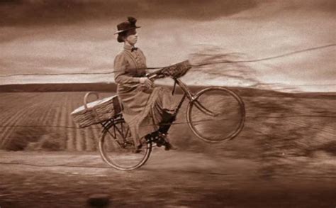 Malevolent witch from the west riding a bicycle